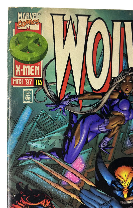 Wolverine #113 - Marvel Comics May 1997, Agent of Evil — Storm Cover, Black Costume Wolverine, X-Men Newsstand (Single Issue)