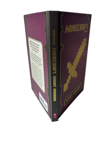 Minecraft: Combat Handbook – Stephanie Milton | Scholastic / Mojang 2014 Hardcover Updated Edition