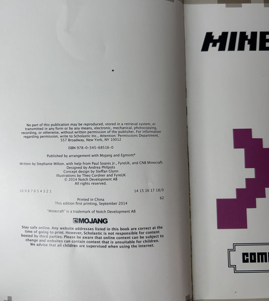 Minecraft: Combat Handbook – Stephanie Milton | Scholastic / Mojang 2014 Hardcover Updated Edition