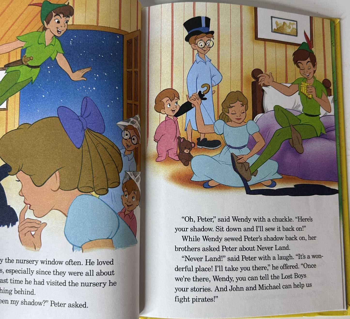 Walt Disney's Peter Pan - interior spread showing Peter Pan visiting the Darling children's nursery and Wendy sewing his shadow