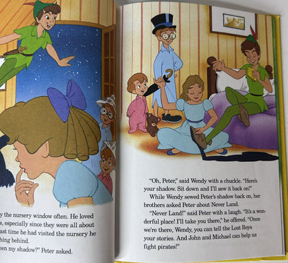 Walt Disney's Peter Pan - interior spread showing Peter Pan visiting the Darling children's nursery and Wendy sewing his shadow
