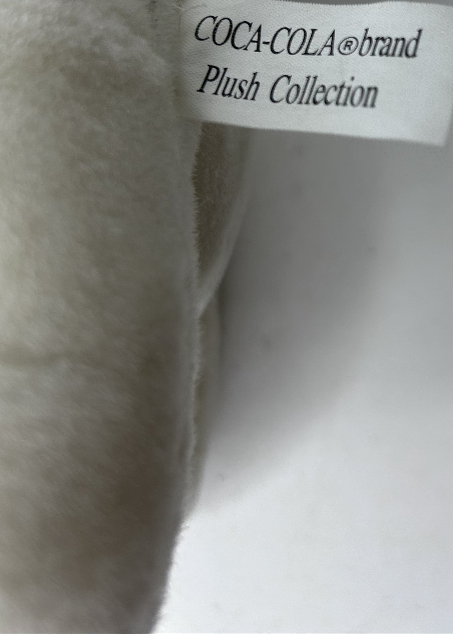 Coca-Cola Polar Bear Plush — Coca-Cola Brand Plush Collection | © 1993 The Coca-Cola Company | Holding Contour Bottle