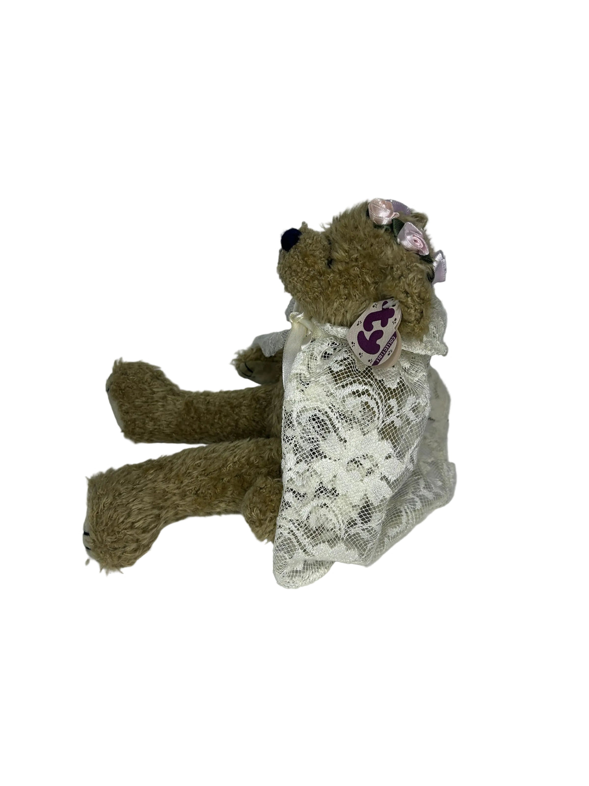 Close-up of Eve bear face and ribbon flower decoration