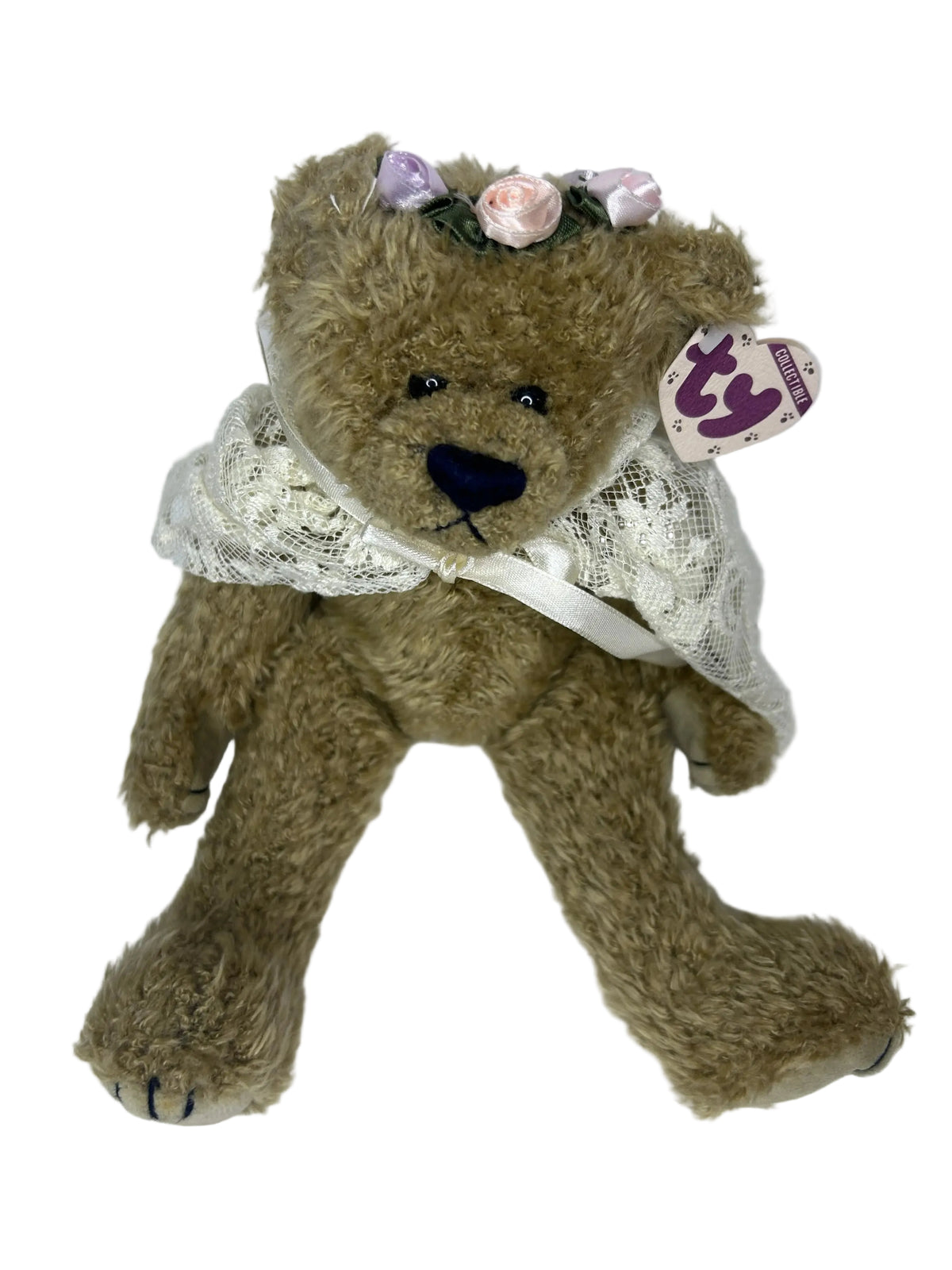 Side view of Eve bear with attached Ty tag