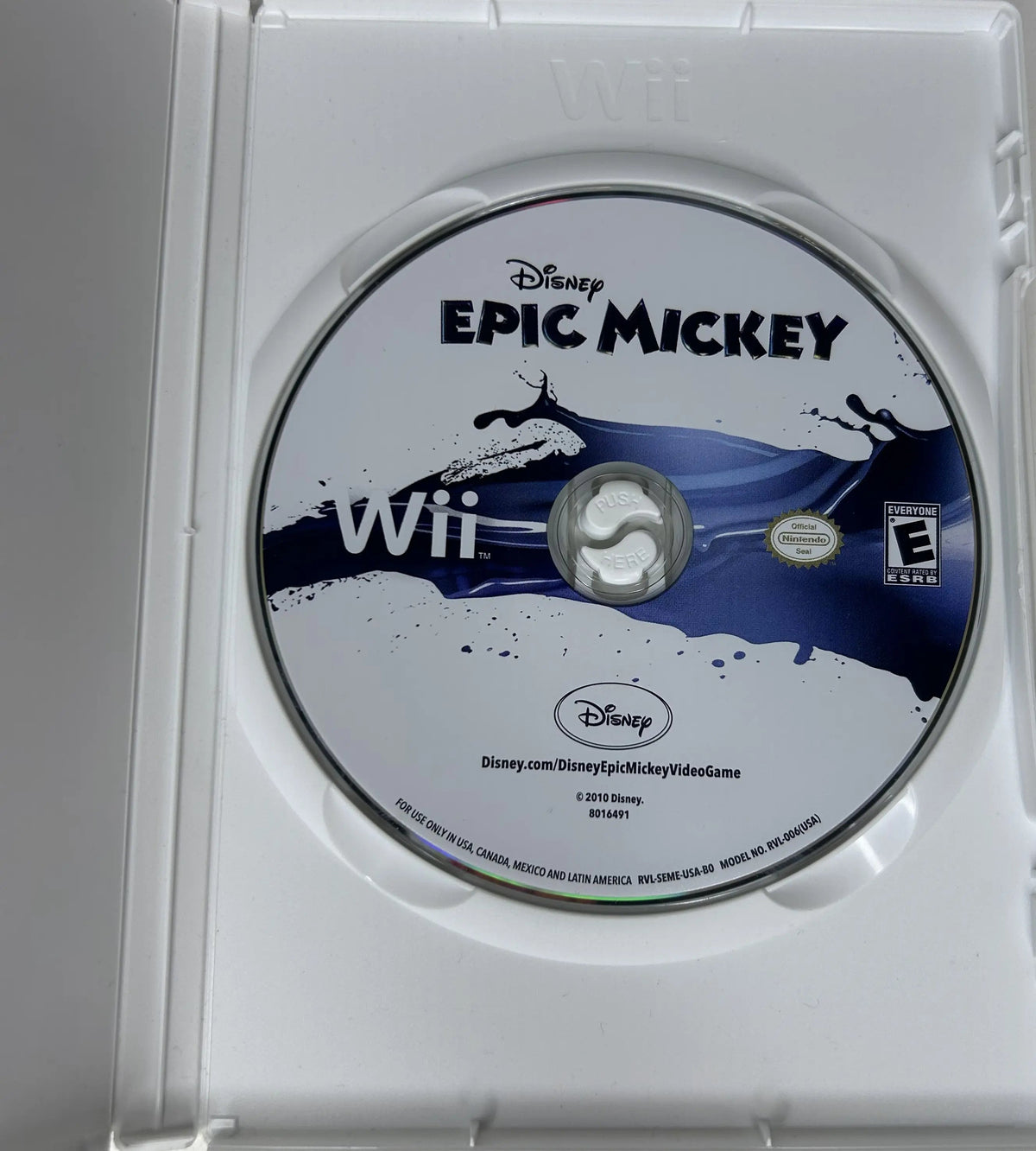 Disney Epic Mickey disc underside and open case